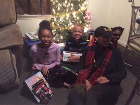 Christmas Gift Recipients Happy to Open their Christmas Gifts
