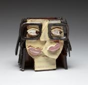 Art Department image of an art piece; a stylized head made out of clay