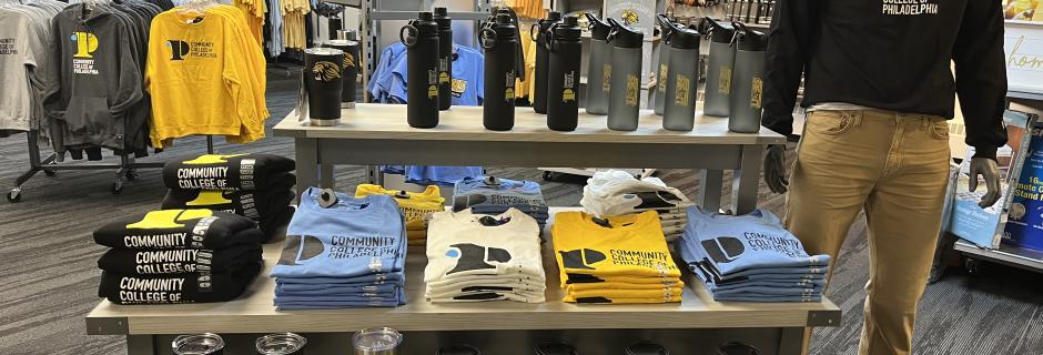 Tee shirts, mugs, travel mugs and water bottles with CCP logos on them for sale in the CCP bookstore.